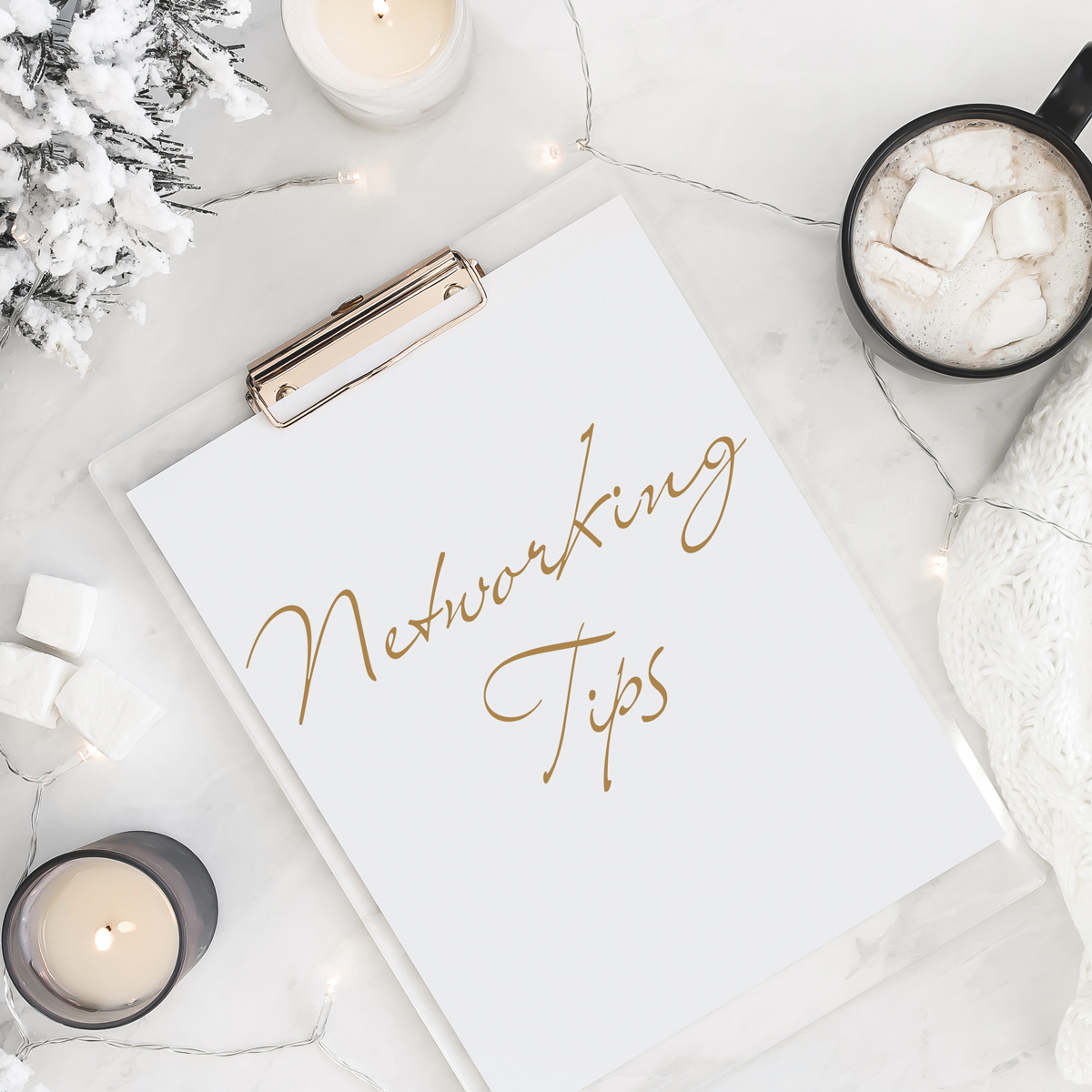 NetWorking-Tips written on clipboard with candles on desk